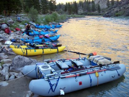 Line up of boats in cluding the Cutthroat 1, Cutthroat 2, and more on the middle Fork of the Salmon.