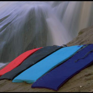 Super Pad, Guide Pad, and Full Pad water proof sleeping pads near a waterfall